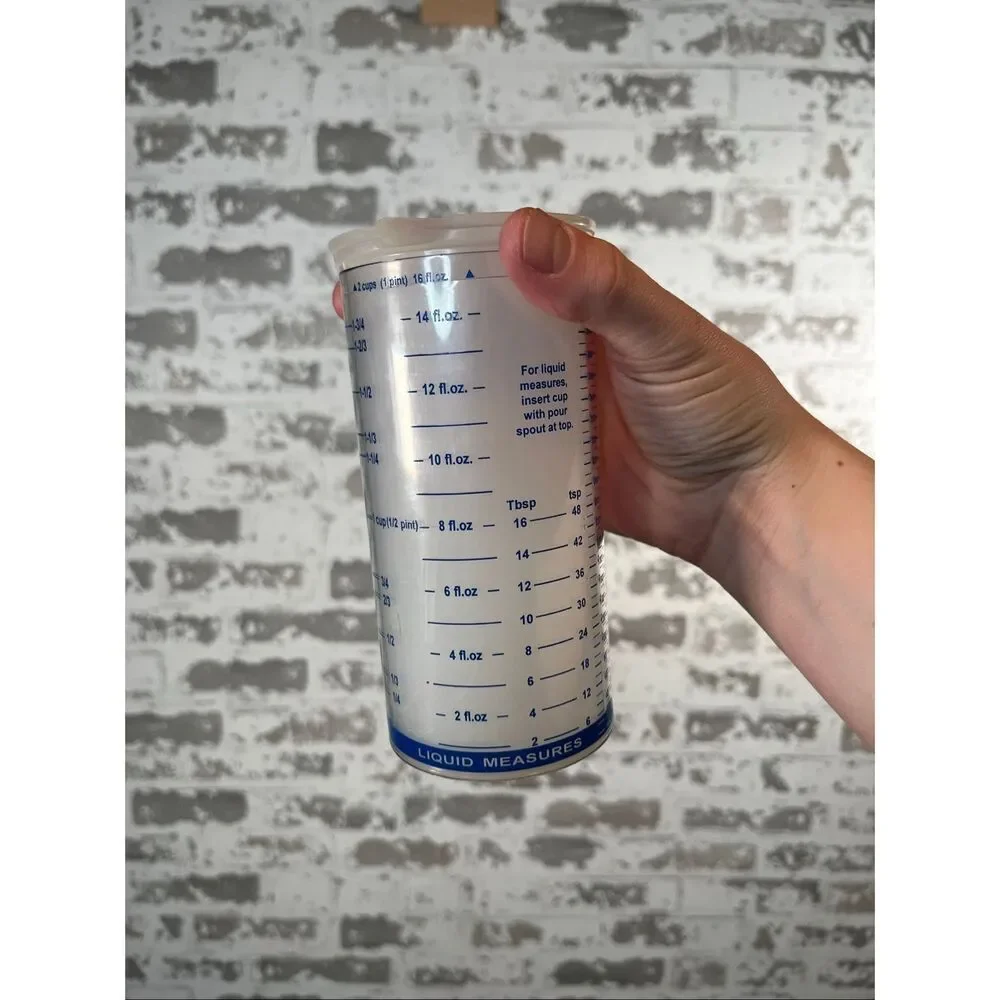 Pampered chef | wet and dry measuring cup dispenser